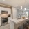 kitchen with an island, ample counter space and modern appliances